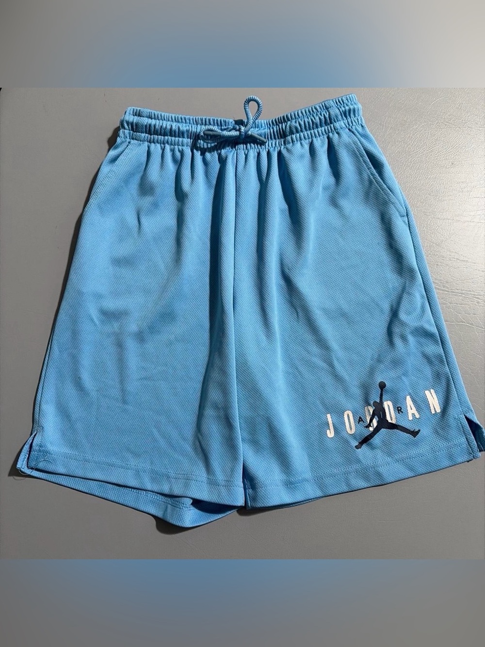 Jordan Boy’s 12 to 13 years Sky Blue Athletic Shorts with Jumpman Logo